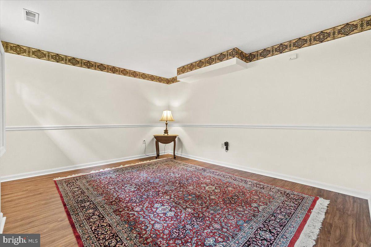 2218 West Greenleaf Drive Frederick, MD 21702 - Photo 26 of 46 a view of a room with racks on the wall