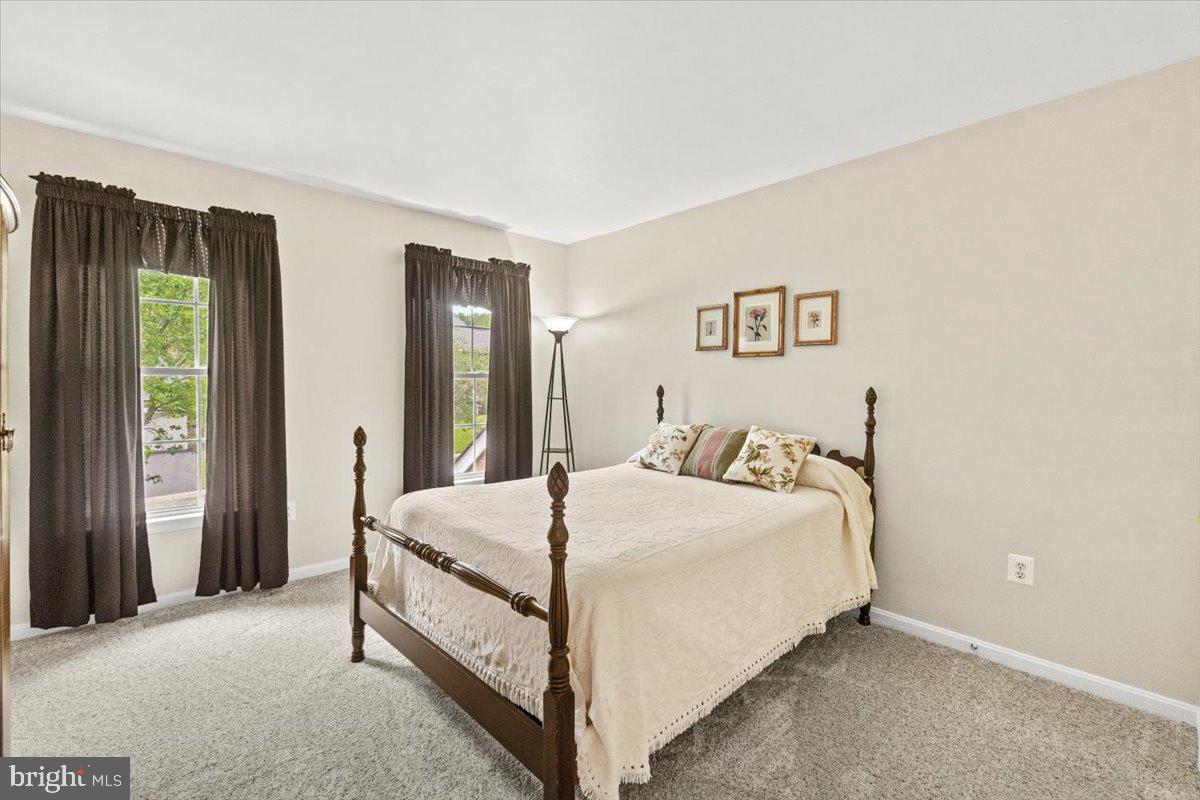 2218 West Greenleaf Drive Frederick, MD 21702 - Photo 27 of 46 a bedroom with a bed and window