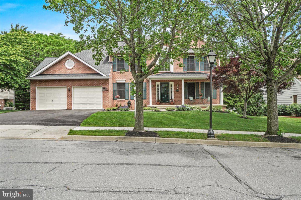 2218 West Greenleaf Drive Frederick, MD 21702 - Photo 46 of 46 a front view of a house with a yard