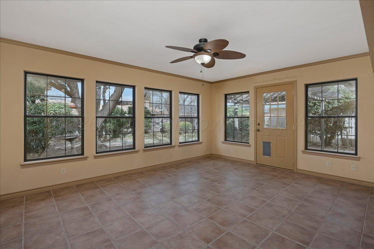 7606 Canode Drive Amarillo, TX 79121 - Photo 15 of 30 a view of an empty room with a window