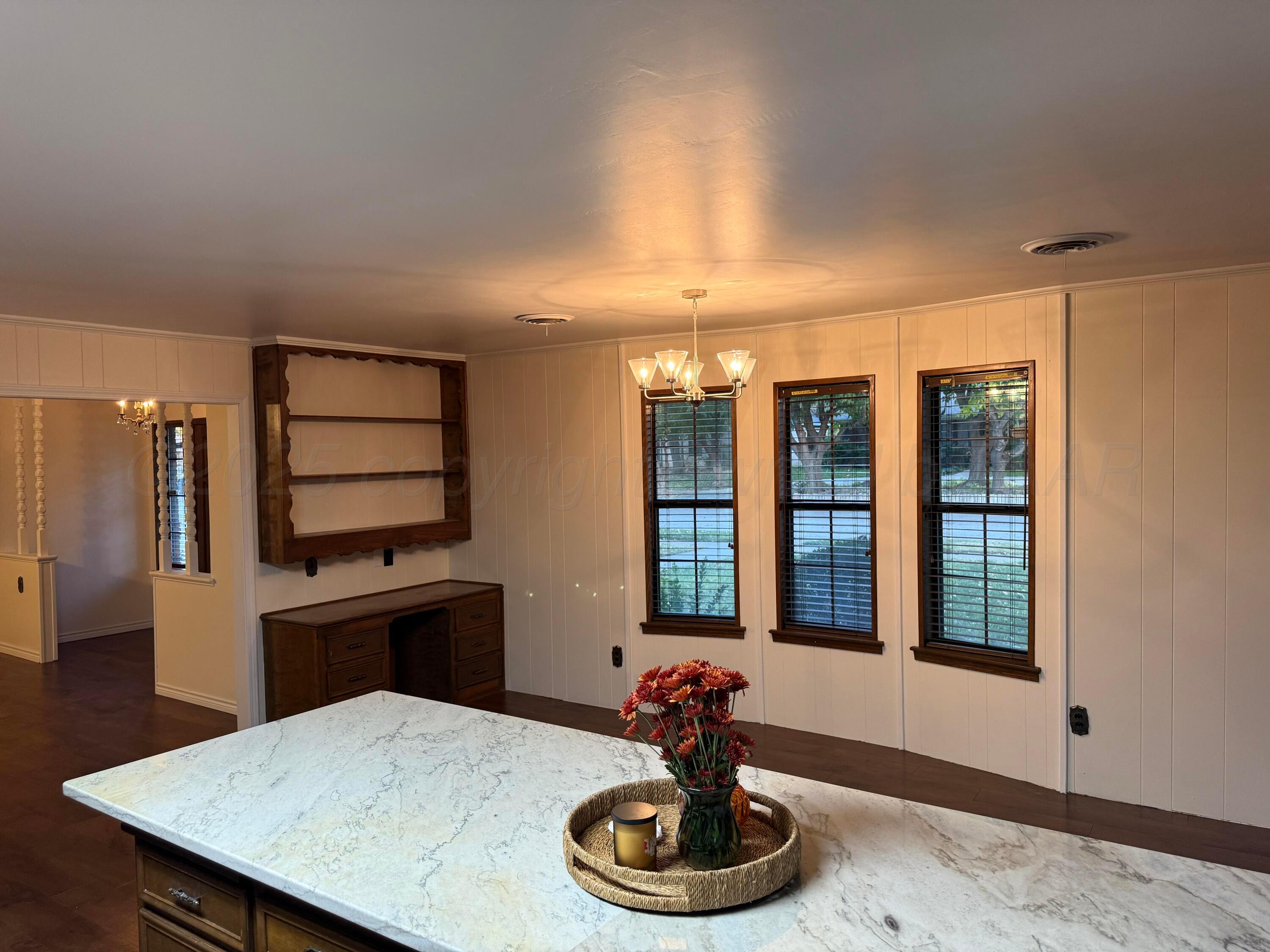 7606 Canode Drive Amarillo, TX 79121 - Photo 9 of 20 a room with furniture and window