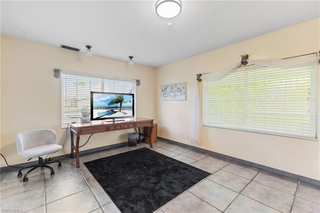 8012 Kansas Road Fort Myers, FL 33967 - Photo 19 of 44 Office space with light tile patterned flooring