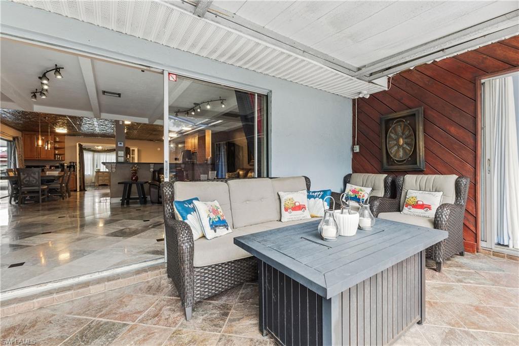 8012 Kansas Road Fort Myers, FL 33967 - Photo 37 of 44 Guest suite patio with pool access