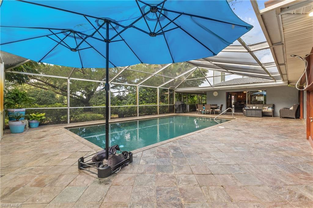 8012 Kansas Road Fort Myers, FL 33967 - Photo 6 of 44 View of pool featuring a patio and a lanai