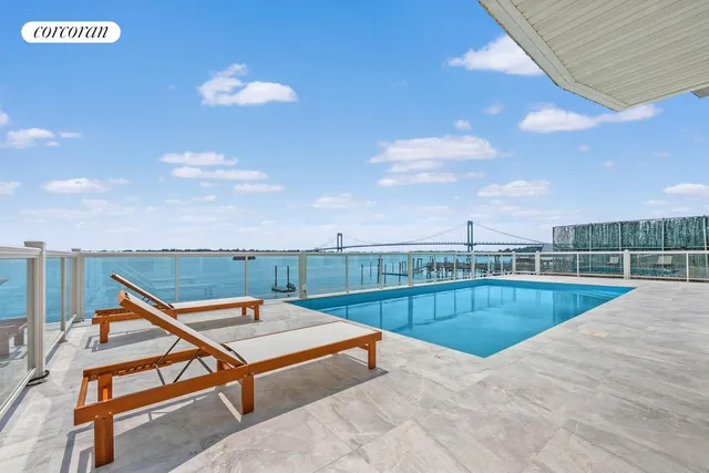 a view of a house with a swimming pool