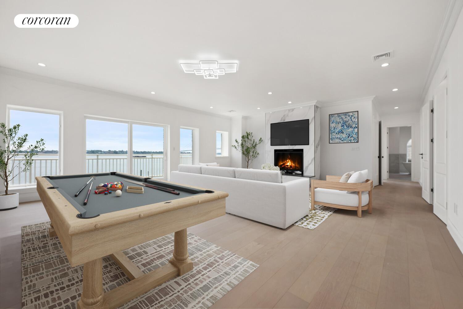 4 Angelas Place Bronx, NY 10026 - Photo 34 of 68 a living room with furniture and a flat screen tv