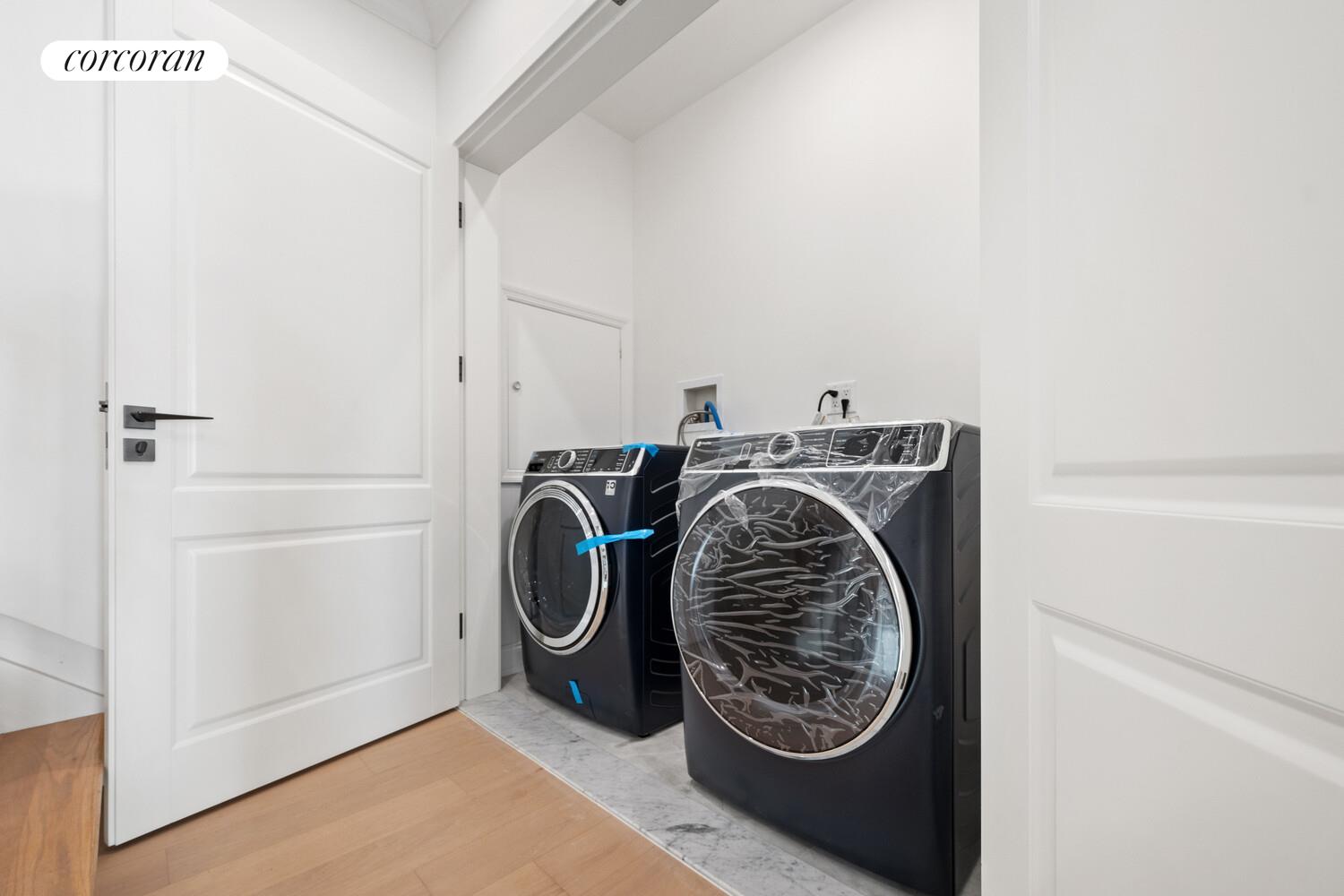 4 Angelas Place Bronx, NY 10026 - Photo 38 of 68 a utility room with dryer and washer