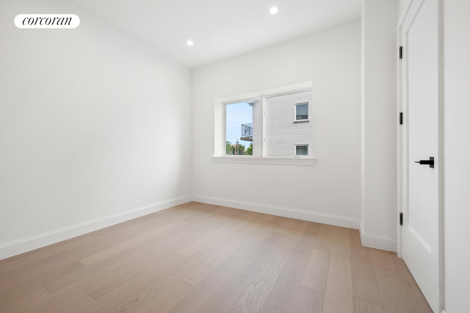 4 Angelas Place Bronx, NY 10026 - Photo 41 of 68 an empty room with windows