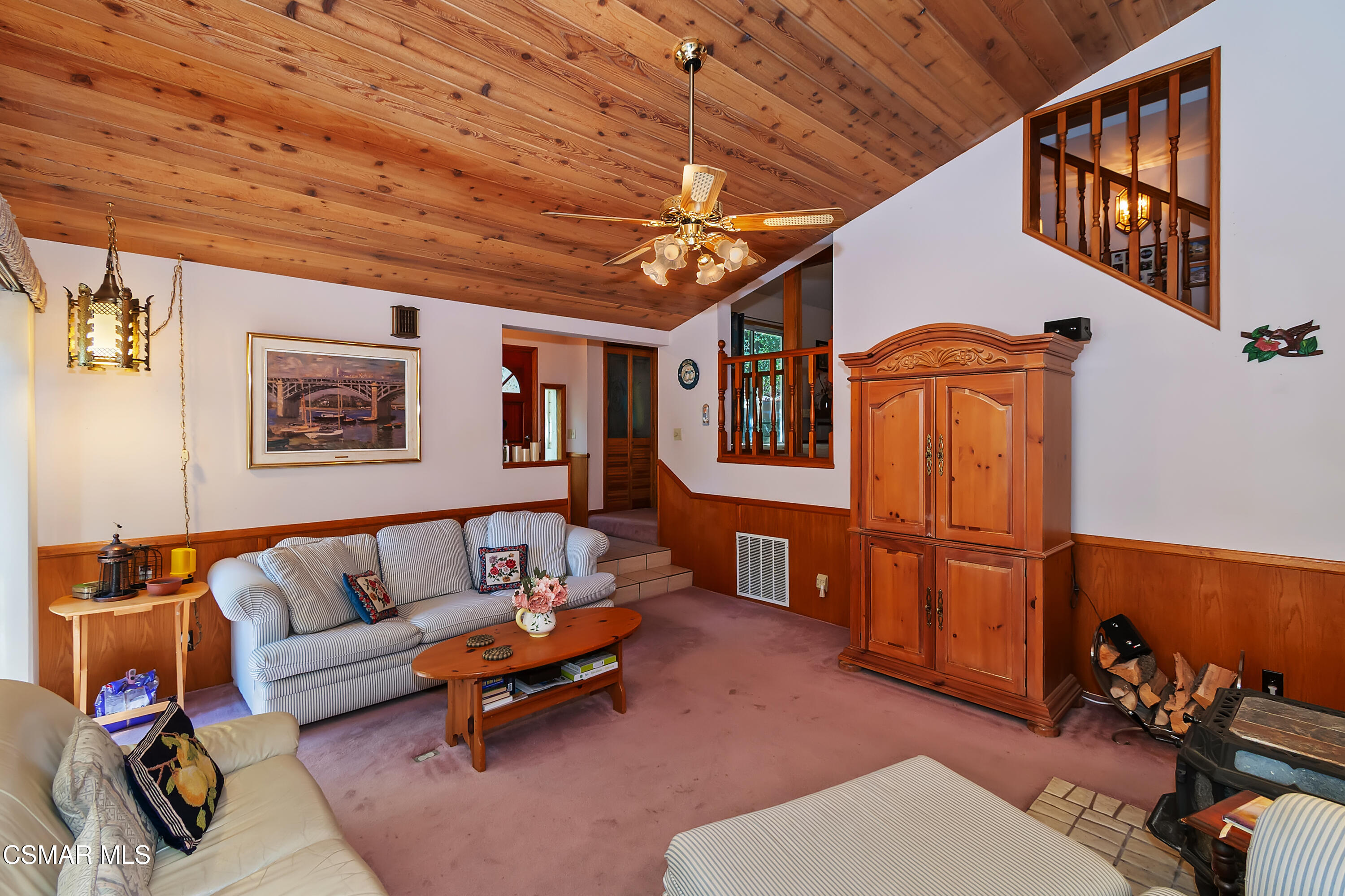 27618 West Shore Road Lake Arrowhead, CA 92352 - Photo 14 of 50 a living room with furniture a rug and a window
