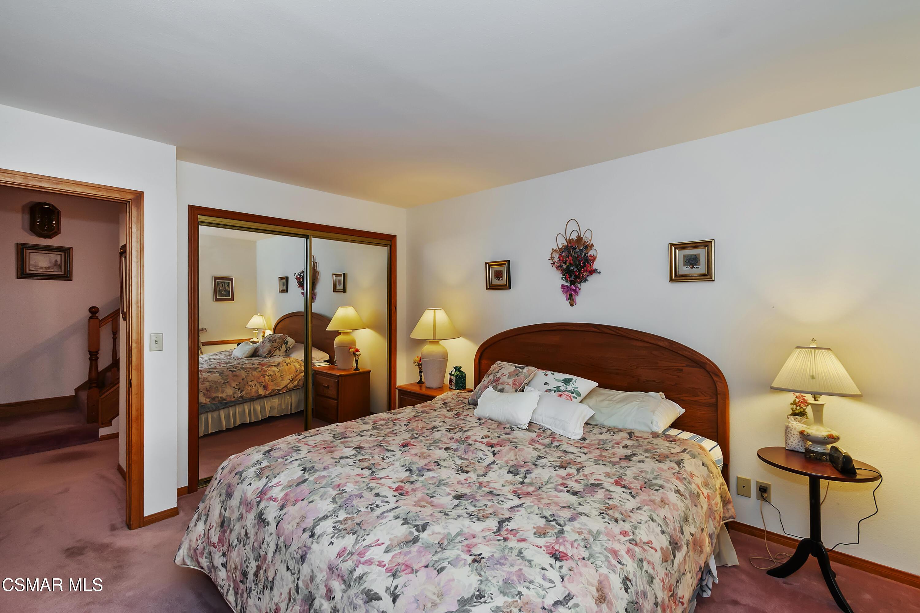 27618 West Shore Road Lake Arrowhead, CA 92352 - Photo 29 of 50 a bedroom with a bed and chair