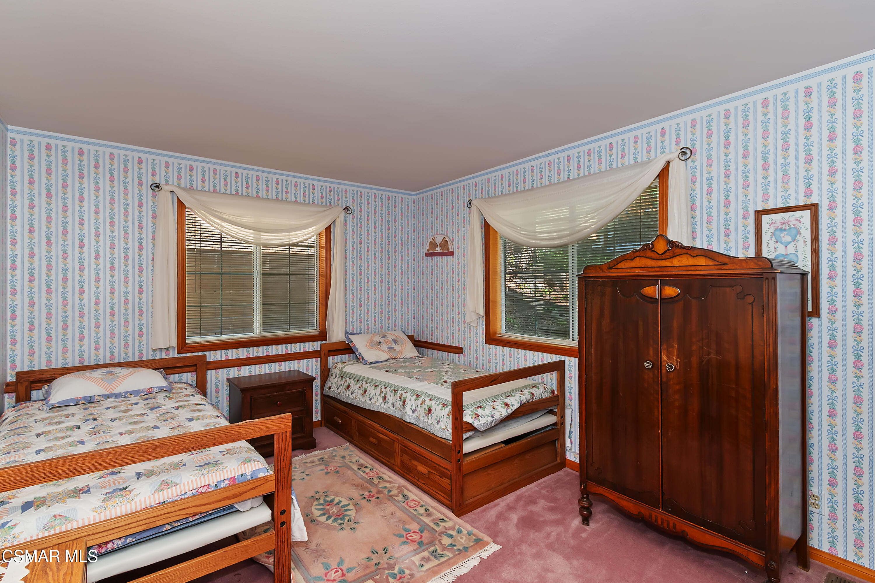 27618 West Shore Road Lake Arrowhead, CA 92352 - Photo 30 of 50 a bedroom with a bed and wooden floor