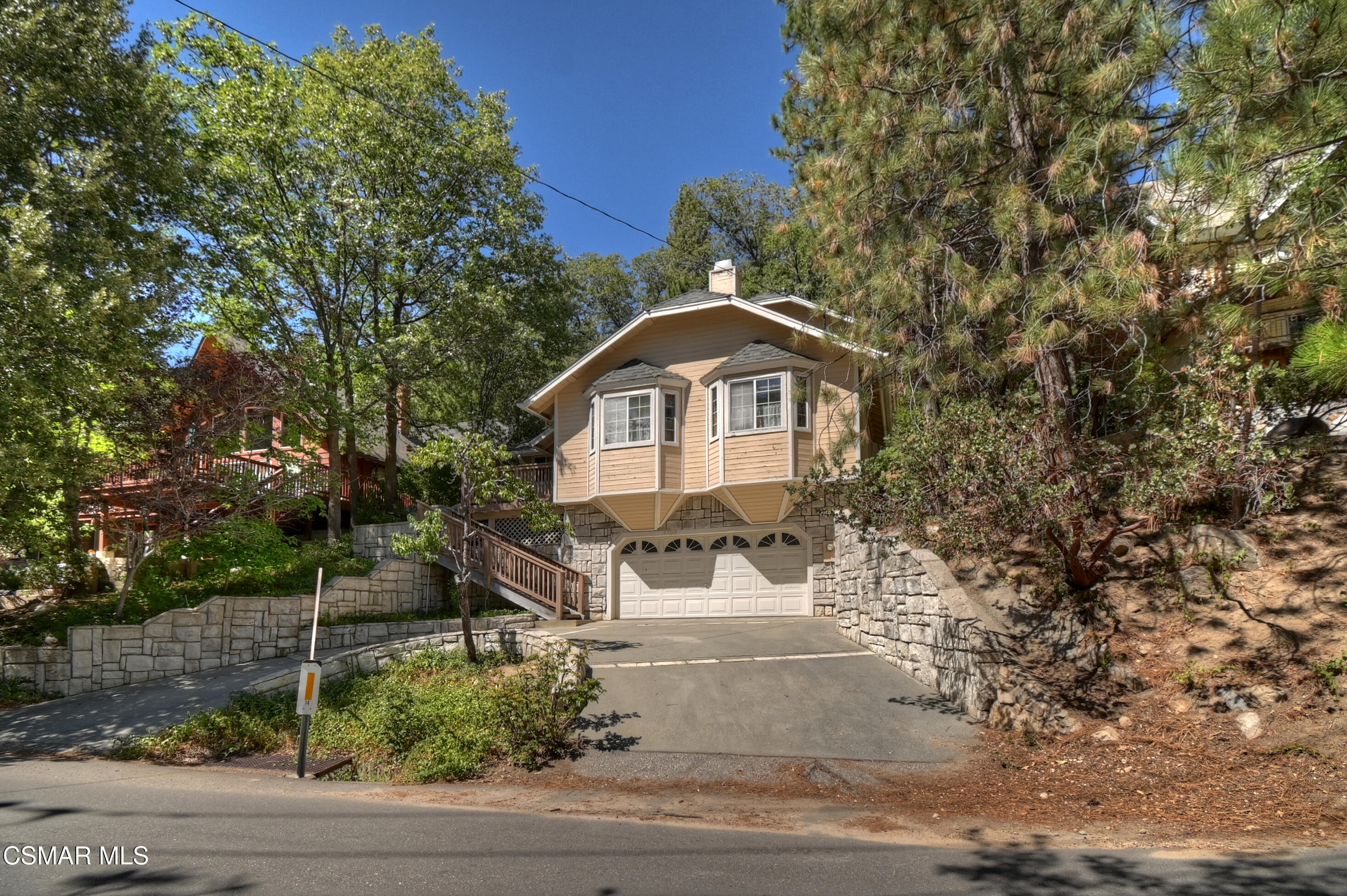 27618 West Shore Road Lake Arrowhead, CA 92352 - Photo 6 of 50 a front view of a house with a yard