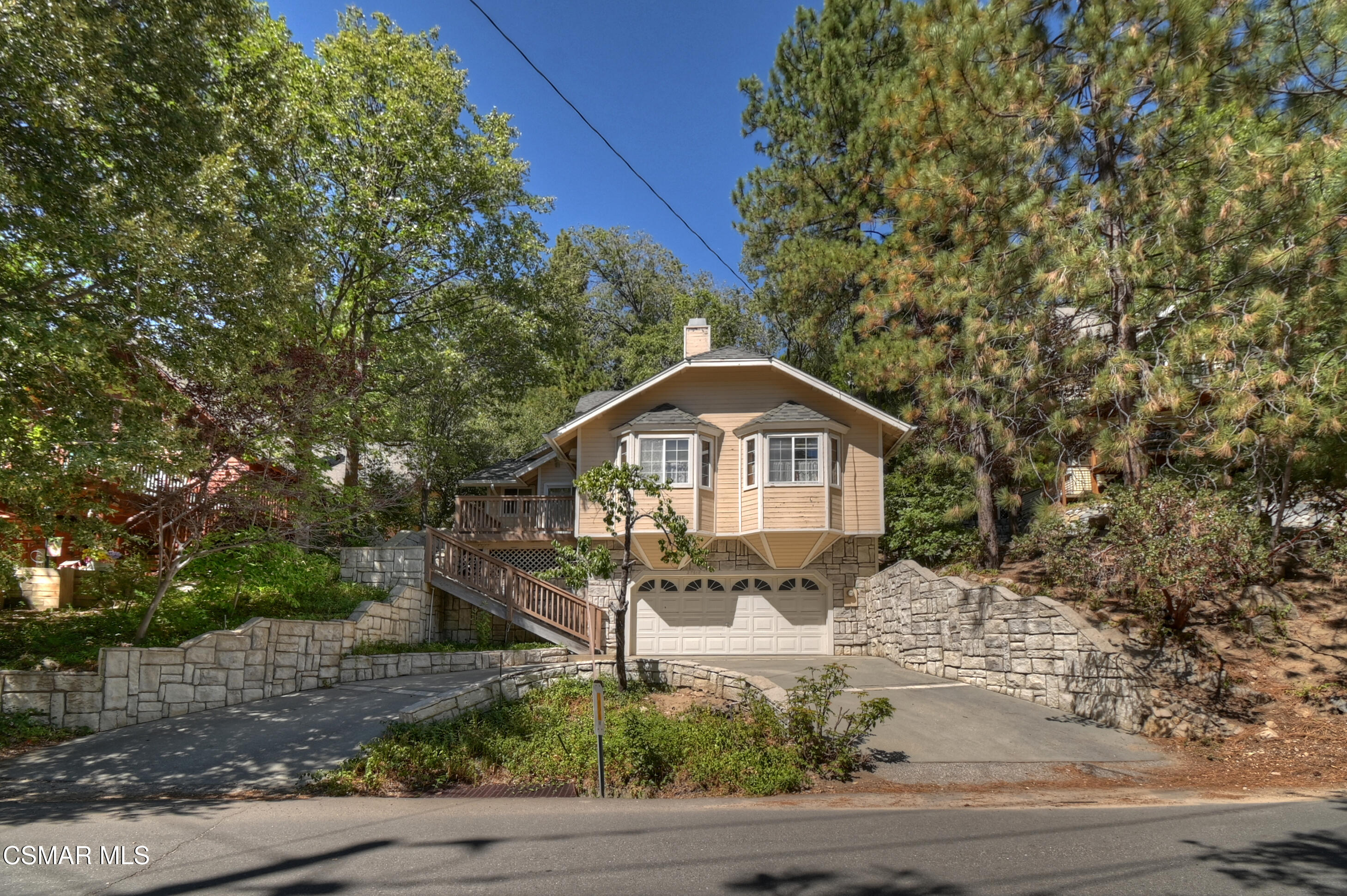 27618 West Shore Road Lake Arrowhead, CA 92352 - Photo 7 of 50 a front view of a house with a yard