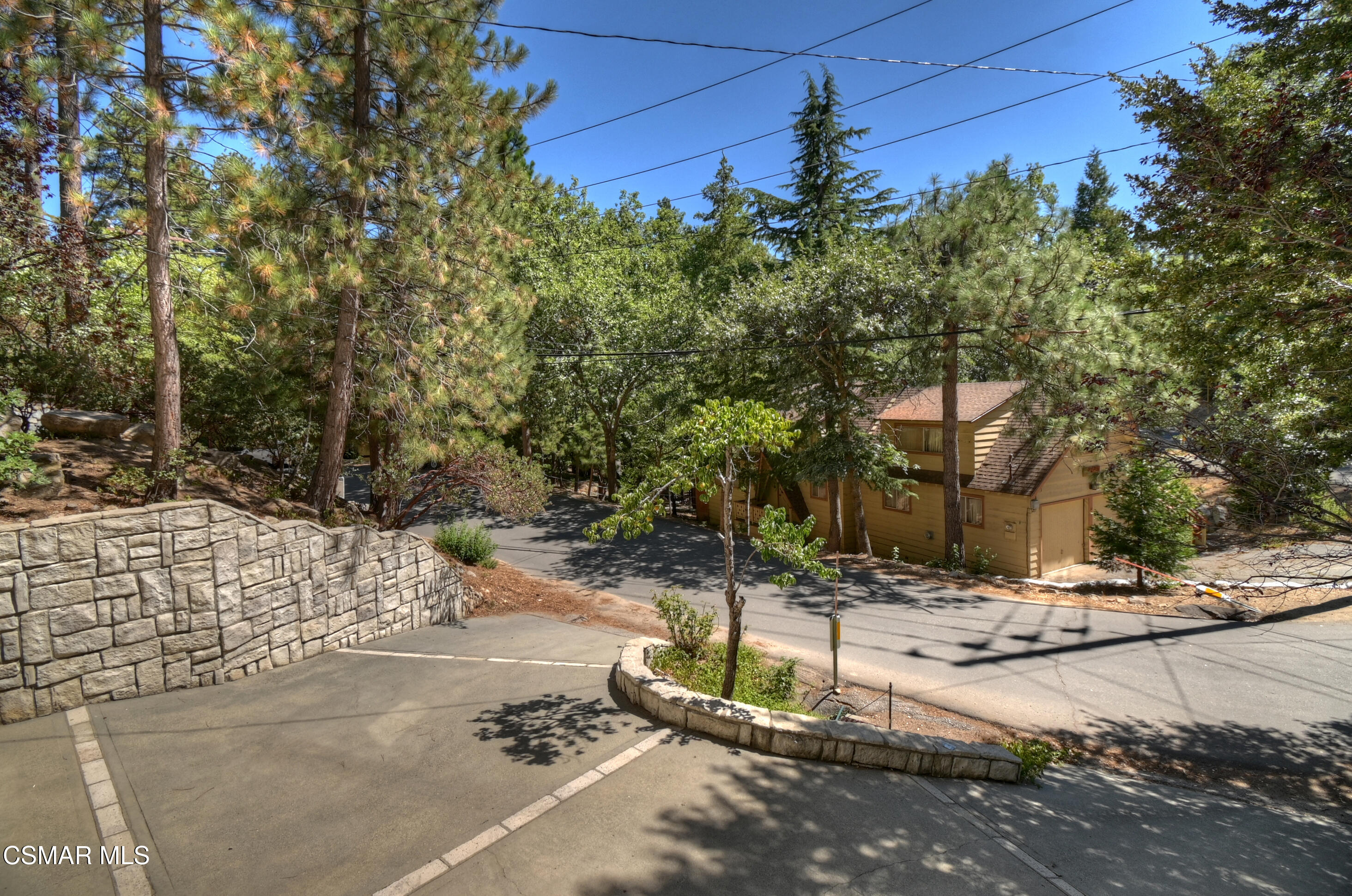 27618 West Shore Road Lake Arrowhead, CA 92352 - Photo 9 of 50 a pathway of a house with a yard
