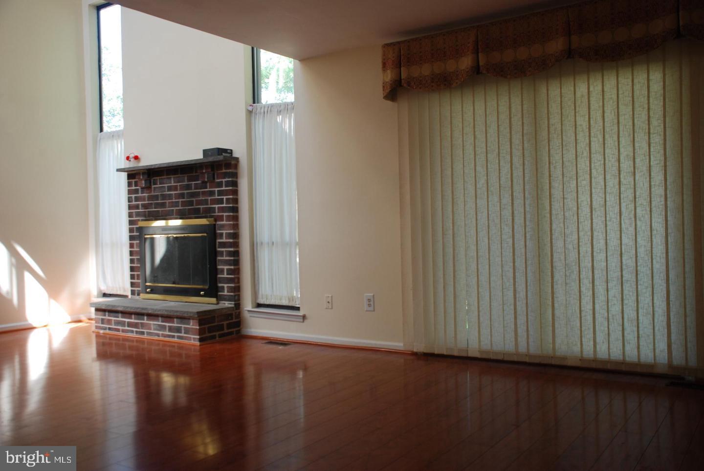 28 Knox Court Chesterbrook, PA 19087 - Photo 9 of 16 an empty room with wooden floor windows and closet