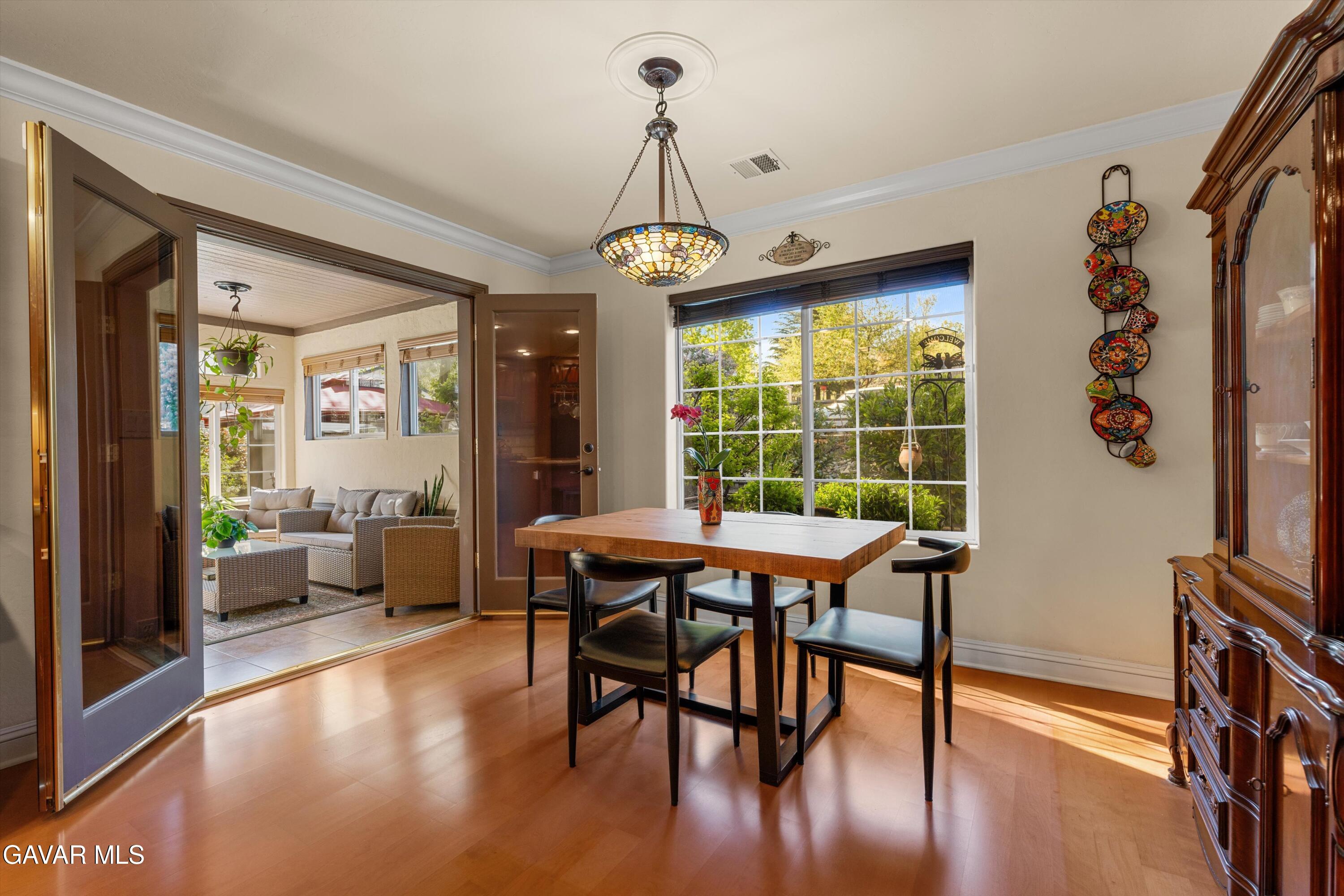 18250 Arosa Road Tehachapi, CA 93561 - Photo 13 of 71 a view of a dining room with furniture window and wooden floor