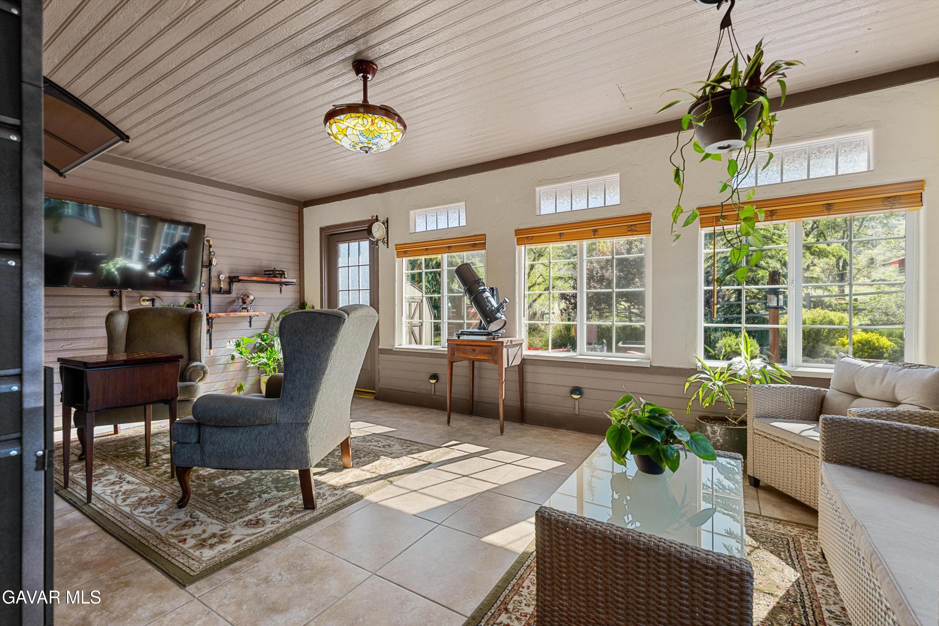 18250 Arosa Road Tehachapi, CA 93561 - Photo 15 of 71 a living room filled with furniture and a table