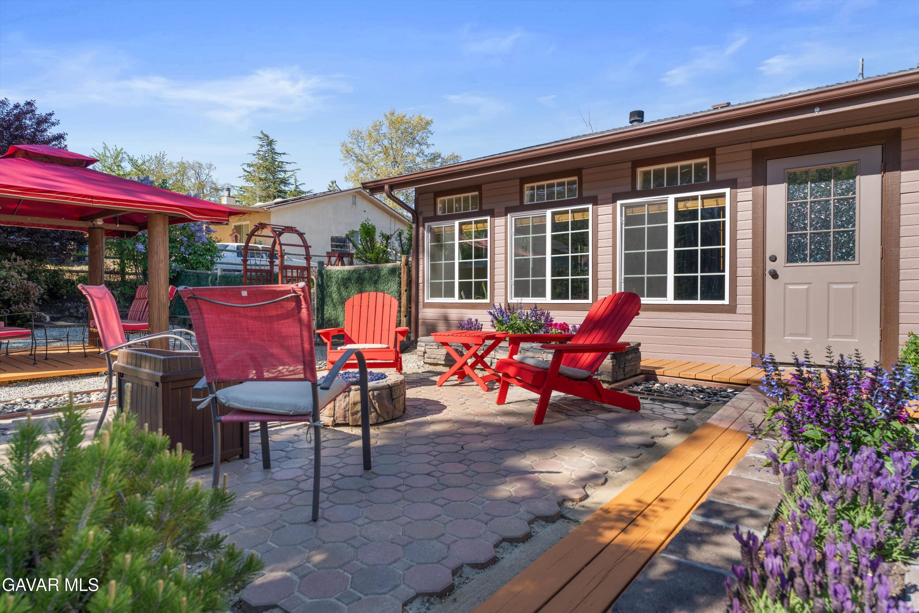18250 Arosa Road Tehachapi, CA 93561 - Photo 33 of 71 a view of a chairs and tables in the patio