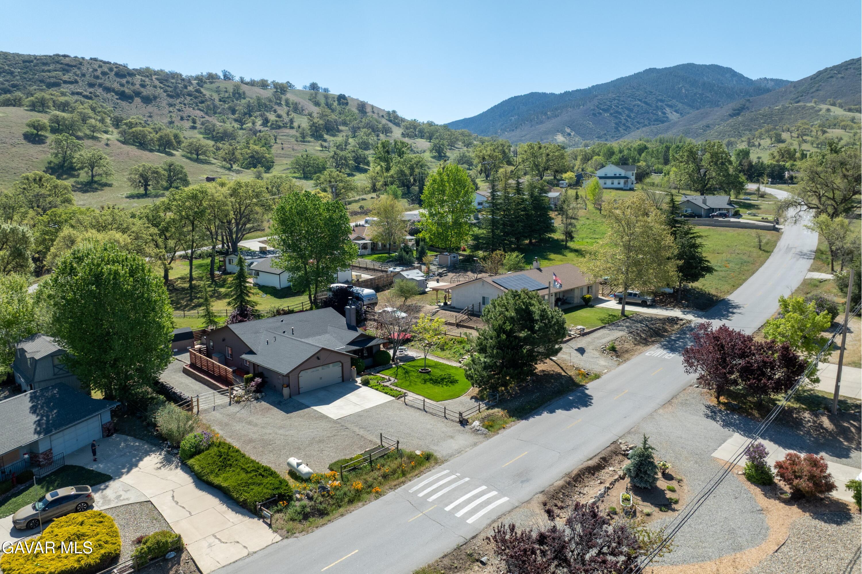 18250 Arosa Road Tehachapi, CA 93561 - Photo 4 of 71 an aerial view of a house with garden