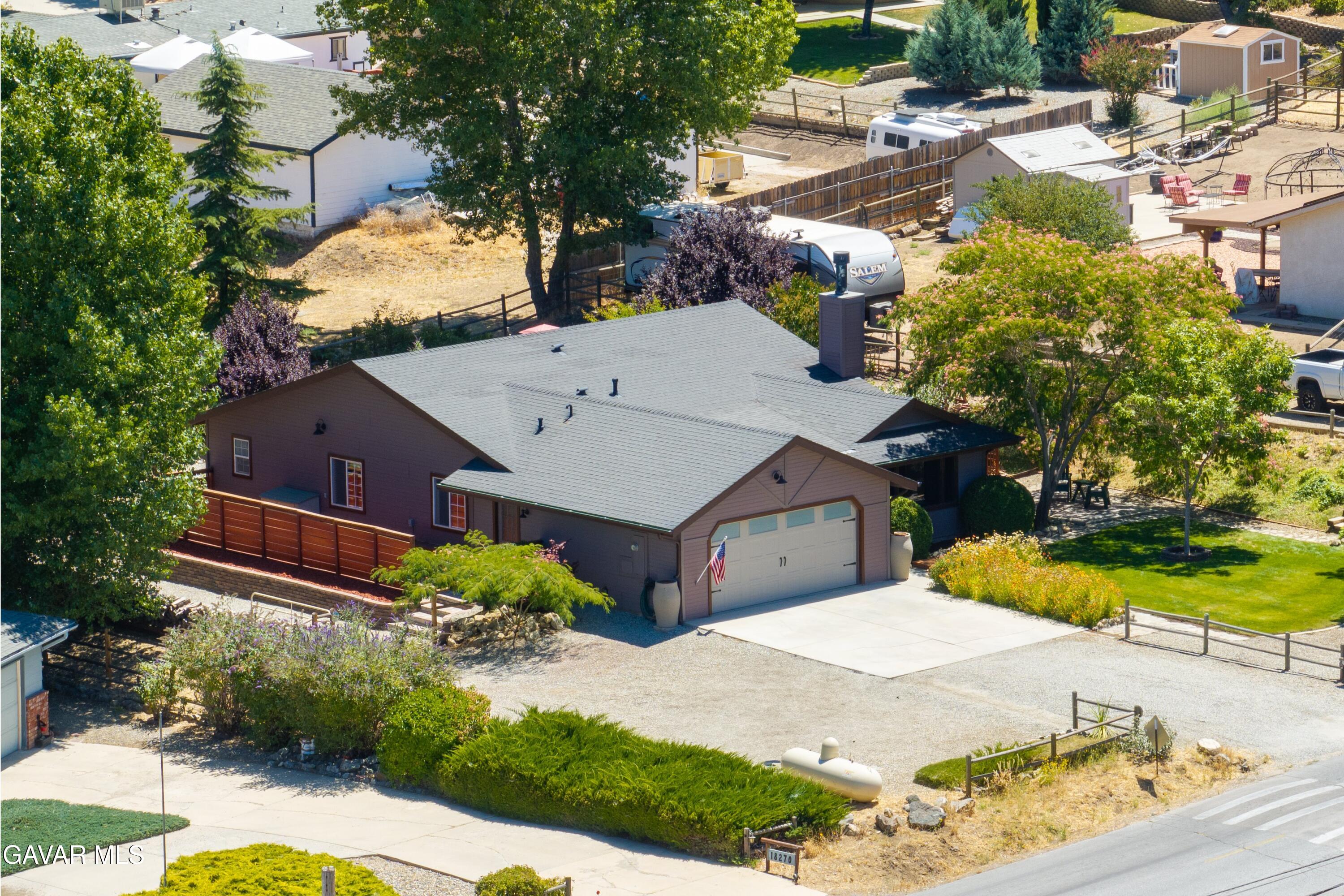 18250 Arosa Road Tehachapi, CA 93561 - Photo 56 of 71 an aerial view of a house with a yard and lake view