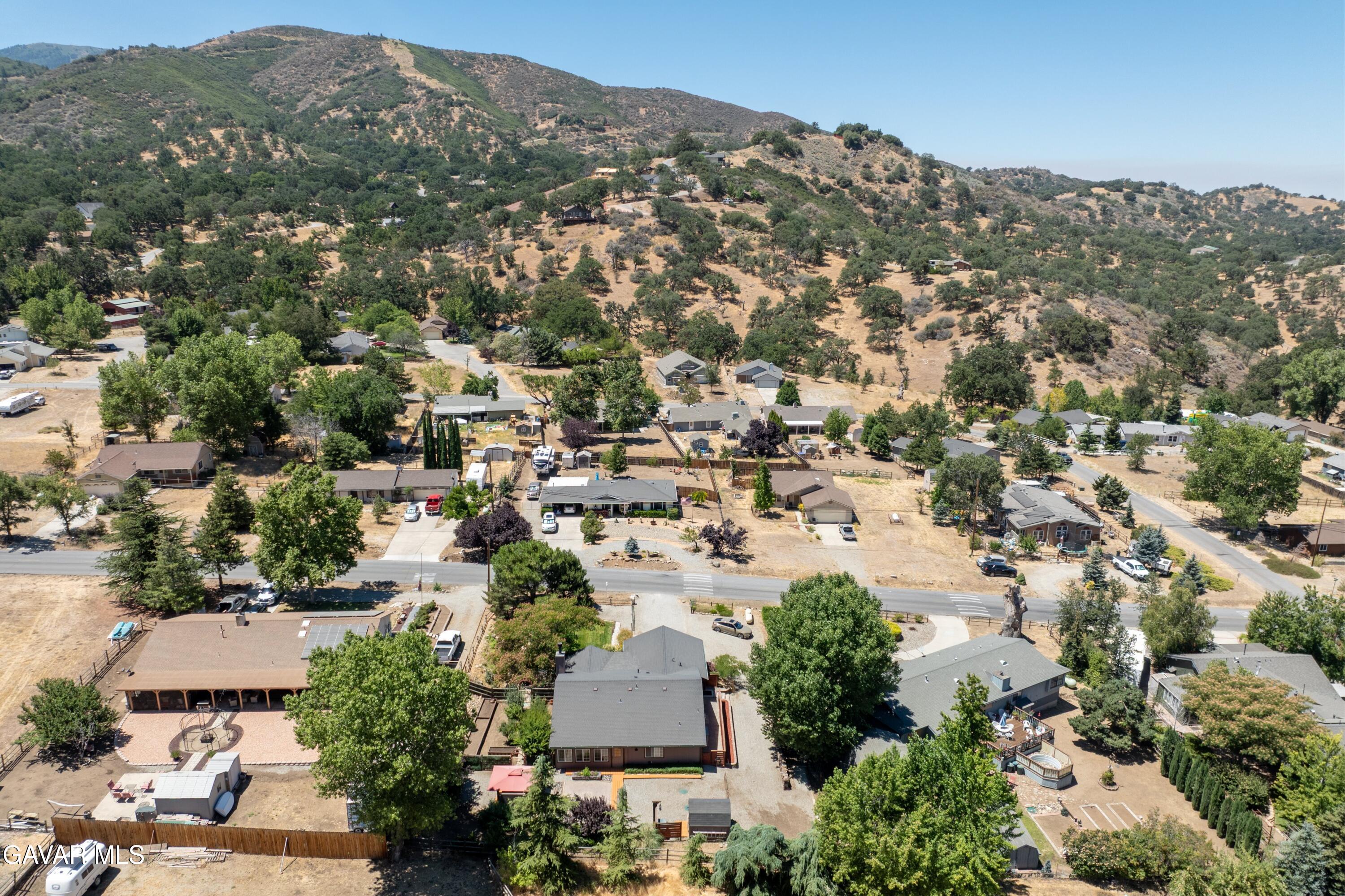 18250 Arosa Road Tehachapi, CA 93561 - Photo 60 of 71 an aerial view of residential houses with outdoor space and trees