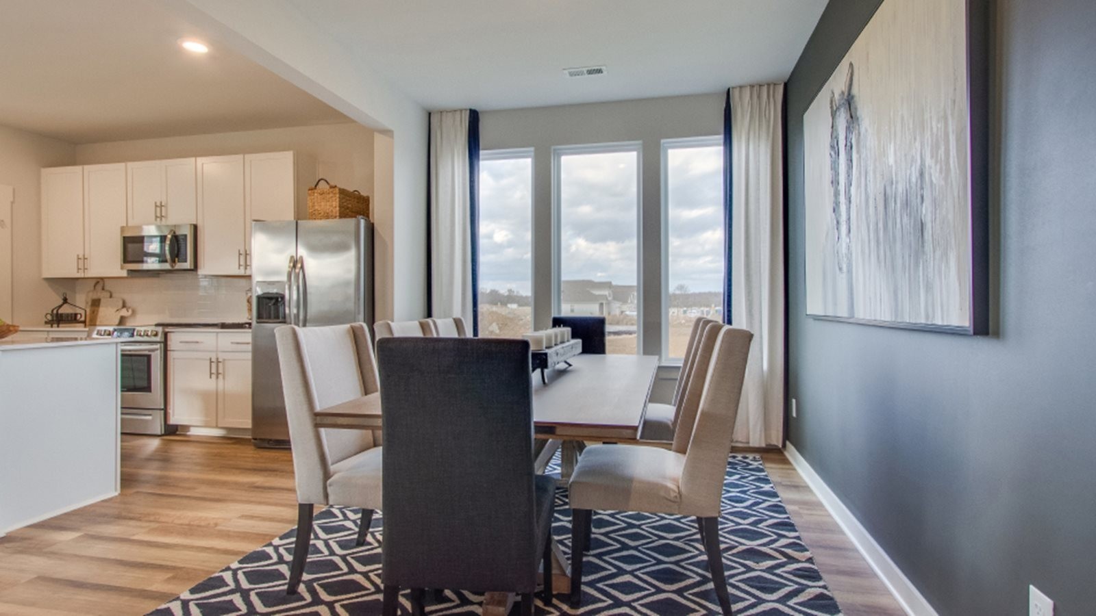219 Goldfinch Road Mount Juliet, TN 37122 - Photo 17 of 58 a view of a dining room with furniture window and wooden floor