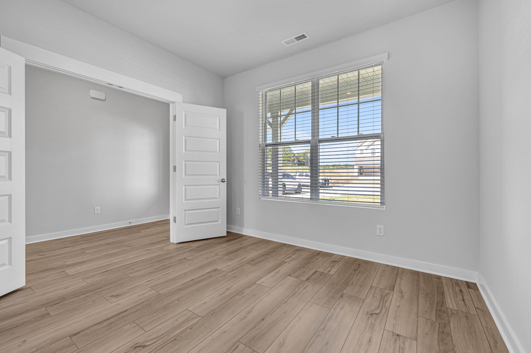 219 Goldfinch Road Mount Juliet, TN 37122 - Photo 28 of 58 wooden floor in an empty room with a window