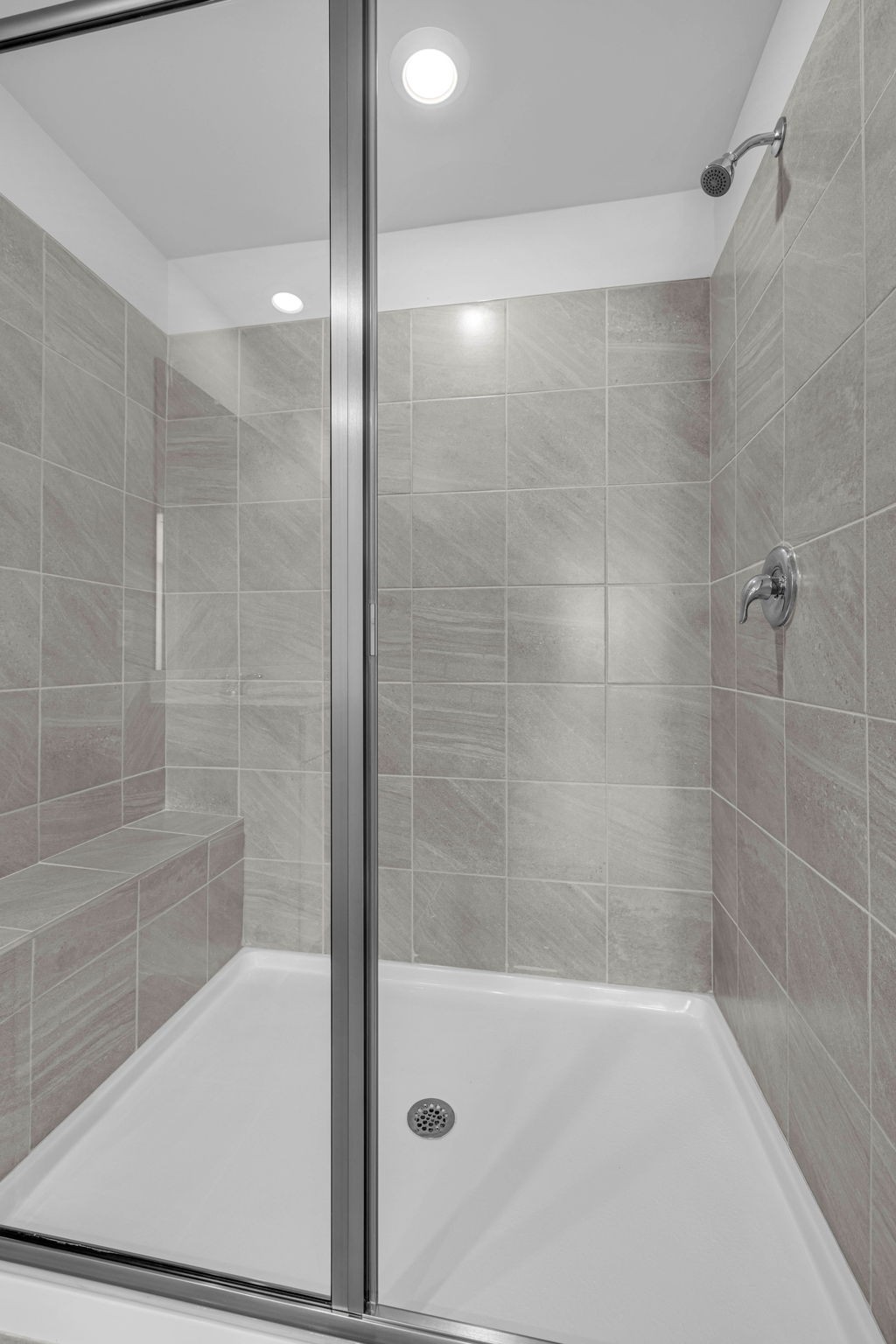 219 Goldfinch Road Mount Juliet, TN 37122 - Photo 40 of 58 a bathroom with a shower and a bathtub