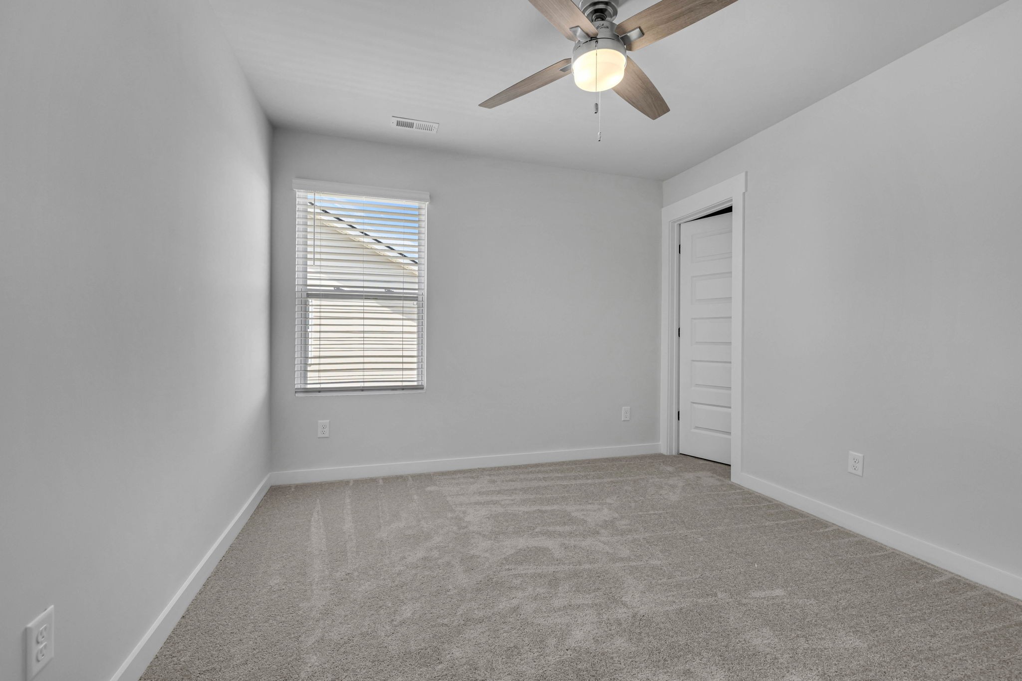 219 Goldfinch Road Mount Juliet, TN 37122 - Photo 47 of 58 an empty room with a window and a fan