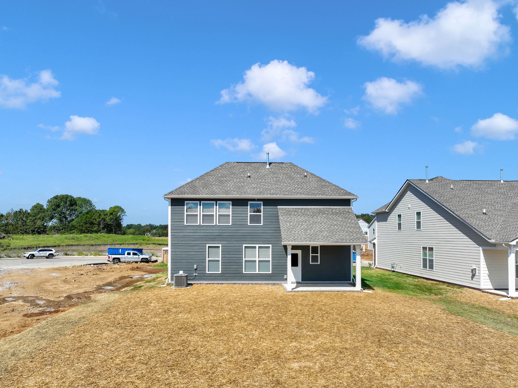 219 Goldfinch Road Mount Juliet, TN 37122 - Photo 57 of 58 a front view of a house with a yard and garage