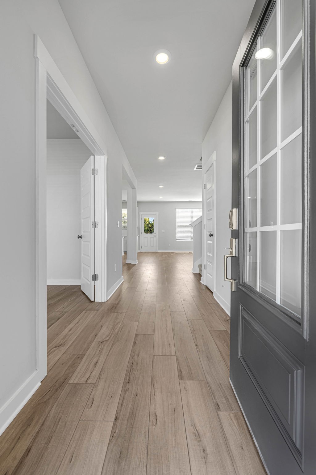 219 Goldfinch Road Mount Juliet, TN 37122 - Photo 6 of 58 a view of wooden floor and windows in an empty room