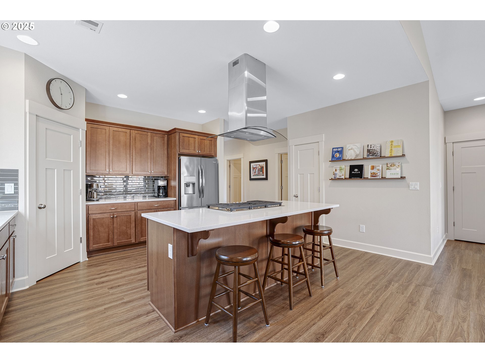 3571 Southwest 31st Street Gresham, OR 97080 - Photo 14 of 37 a kitchen with stainless steel appliances granite countertop a wooden table chairs and cabinets
