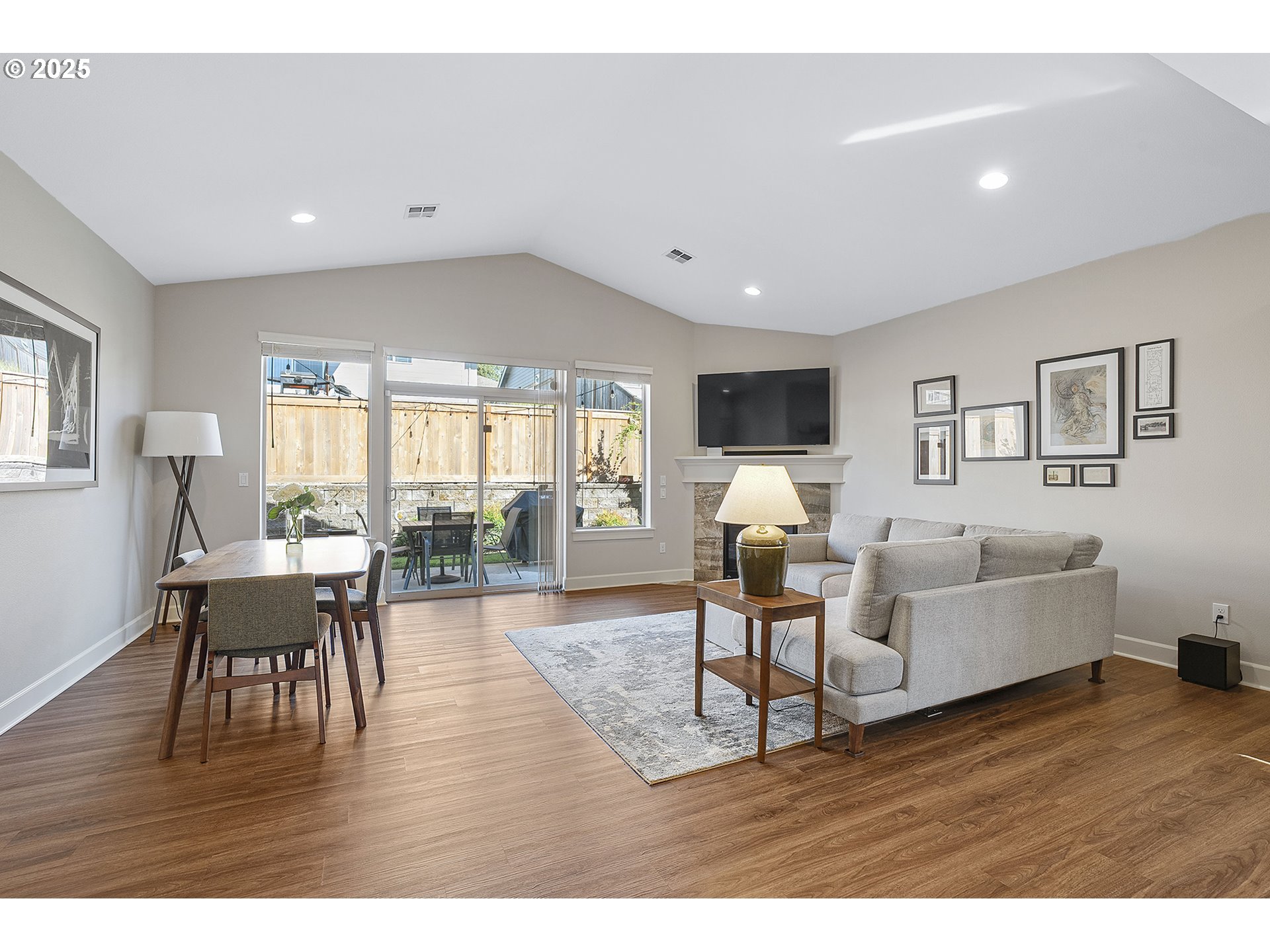 3571 Southwest 31st Street Gresham, OR 97080 - Photo 16 of 37 a living room with furniture and a wooden floor