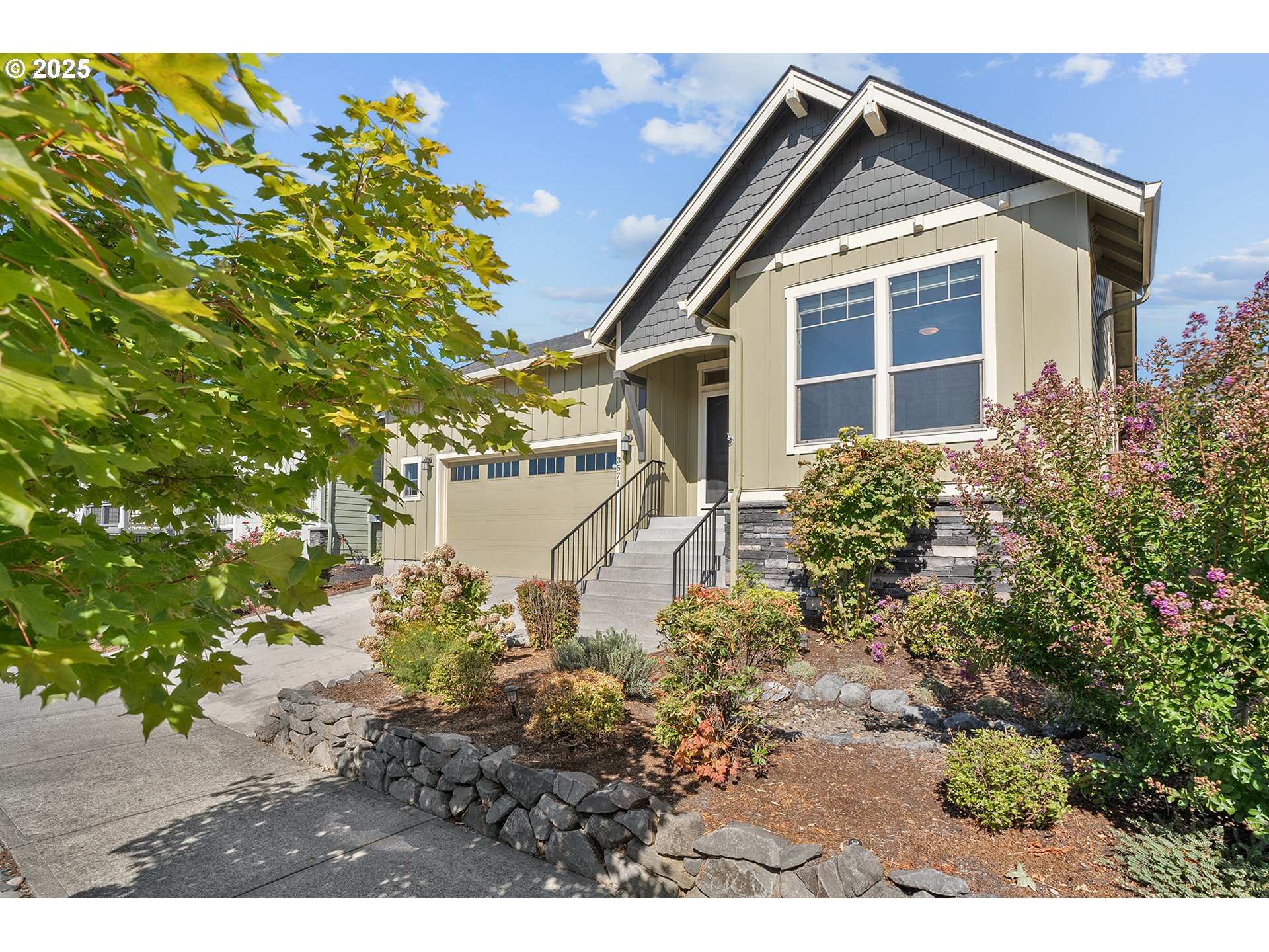 3571 Southwest 31st Street Gresham, OR 97080 - Photo 2 of 37 a view of a house with a yard