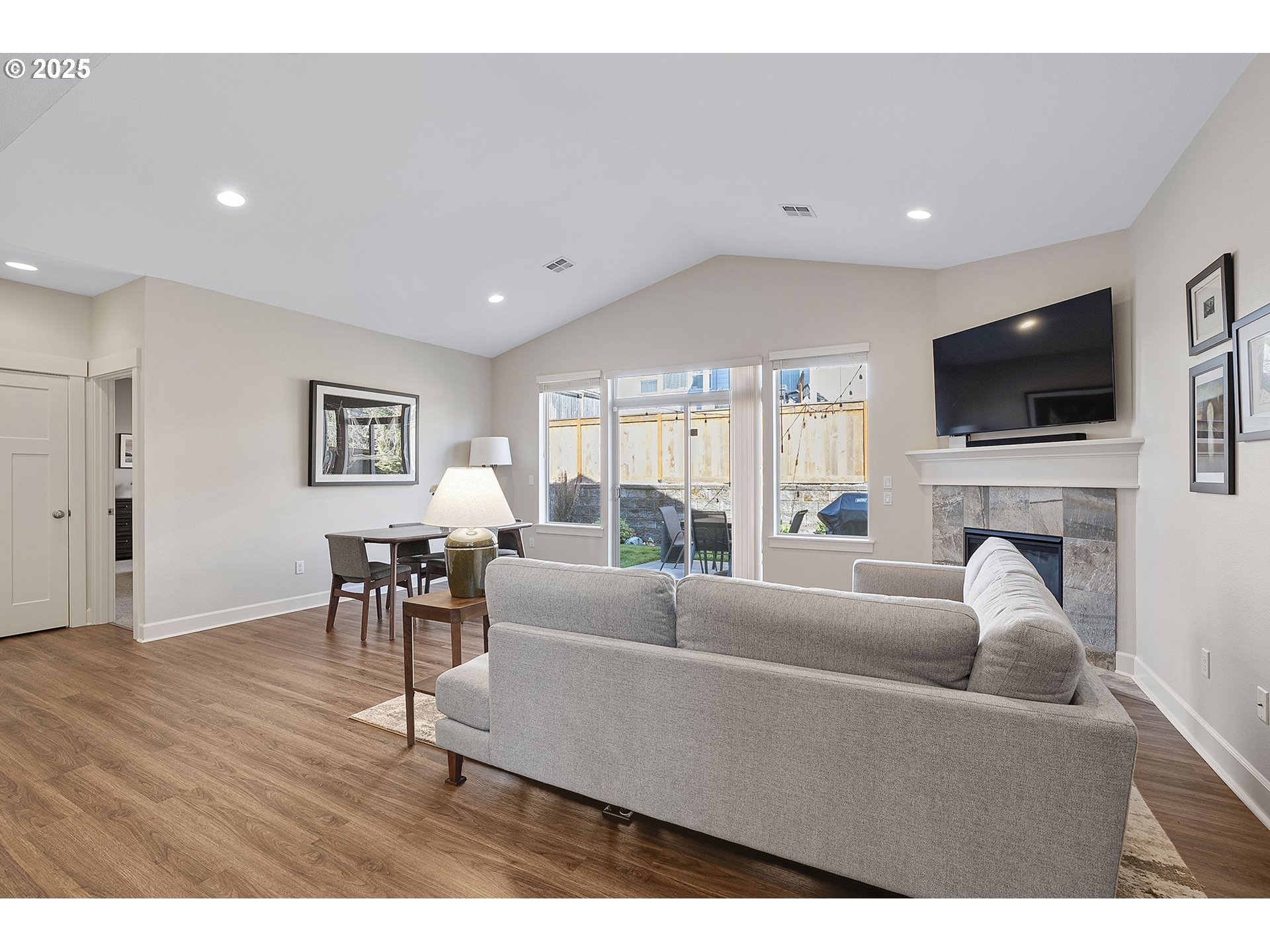 3571 Southwest 31st Street Gresham, OR 97080 - Photo 22 of 37 a living room with furniture and a flat screen tv