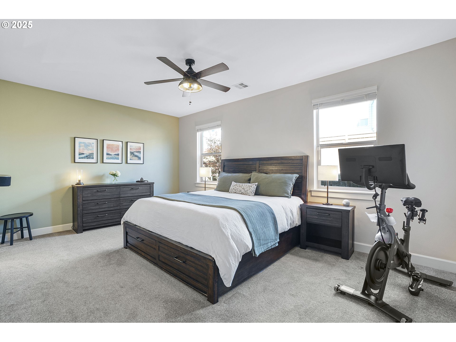 3571 Southwest 31st Street Gresham, OR 97080 - Photo 24 of 37 a bedroom with a bed and a flat screen tv