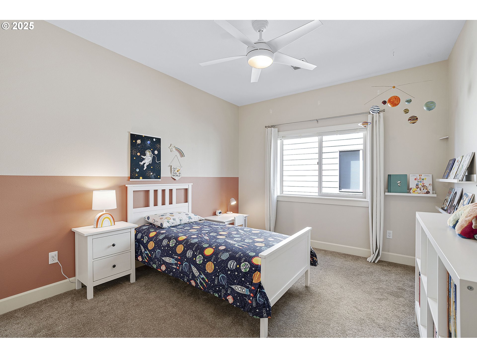 3571 Southwest 31st Street Gresham, OR 97080 - Photo 30 of 37 a bedroom with a bed next to a window with a dresser