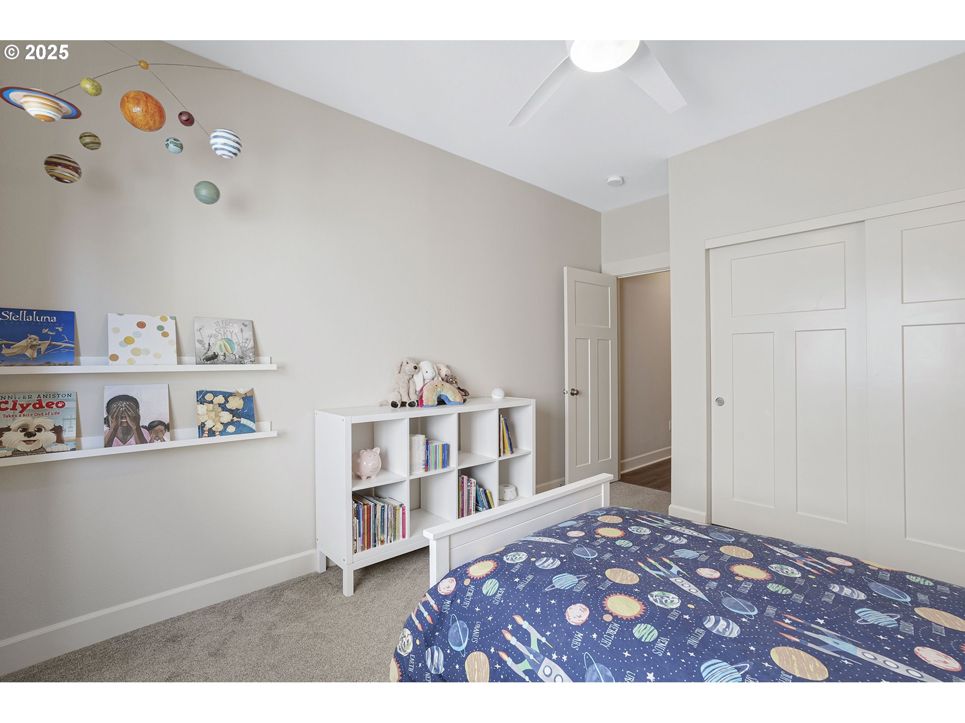 3571 Southwest 31st Street Gresham, OR 97080 - Photo 31 of 37 a bedroom with a bed and closet