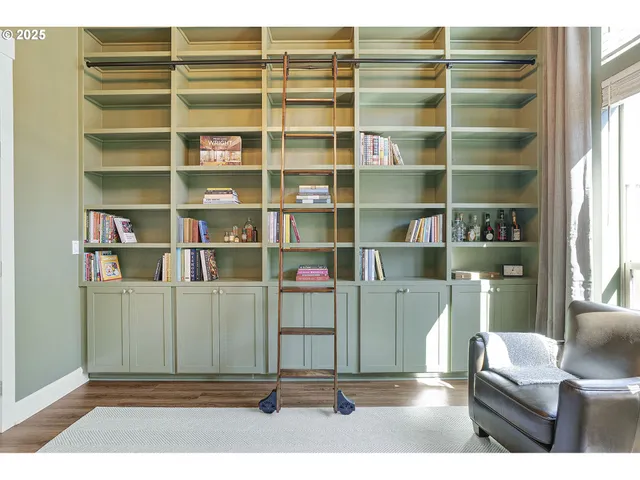 a view of a livingroom with shelves
