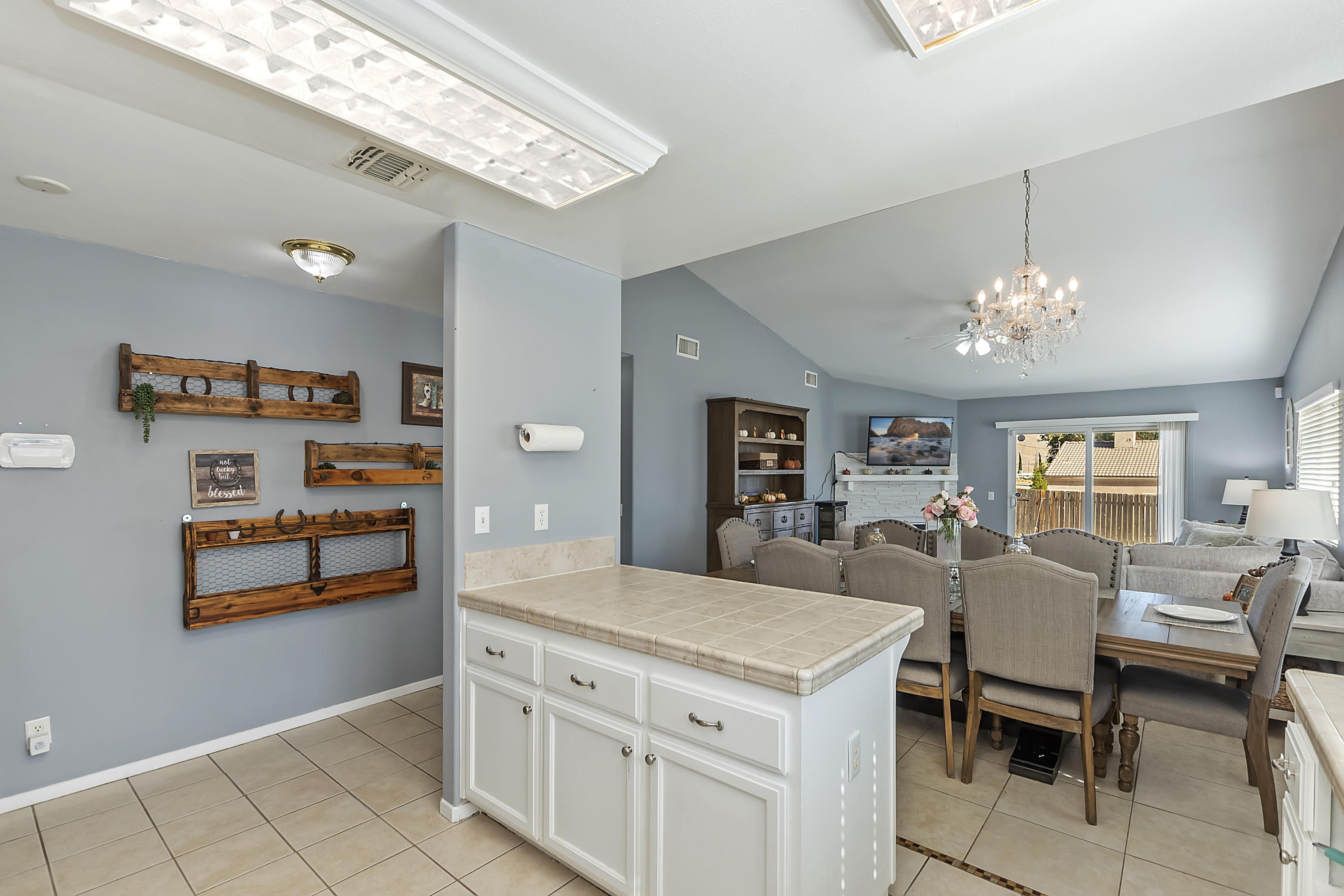13140 Zane Way Whitewater, CA 92282 - Photo 11 of 25 a view of a dining room with furniture and chandelier