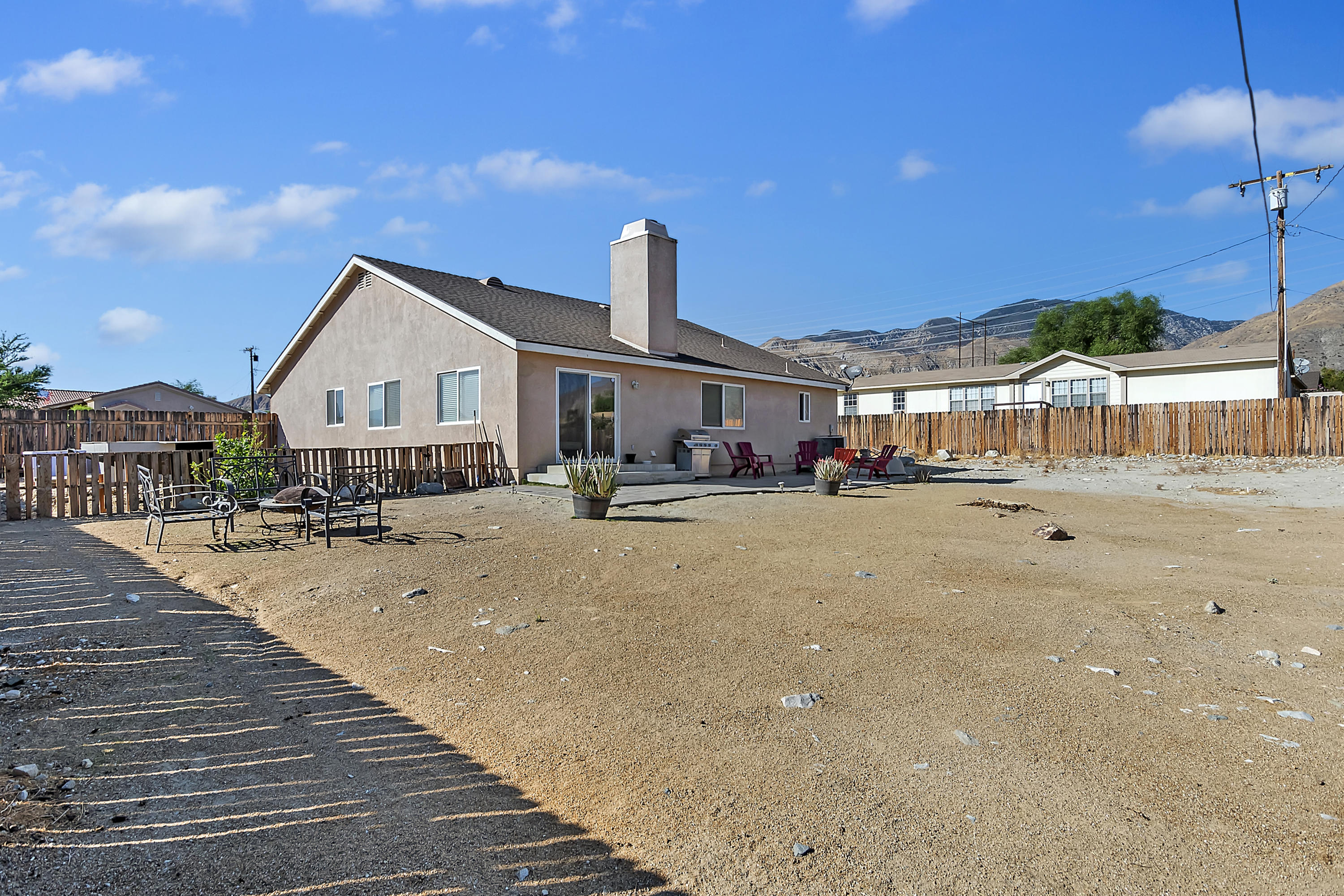 13140 Zane Way Whitewater, CA 92282 - Photo 25 of 25 a front view of a house with a patio