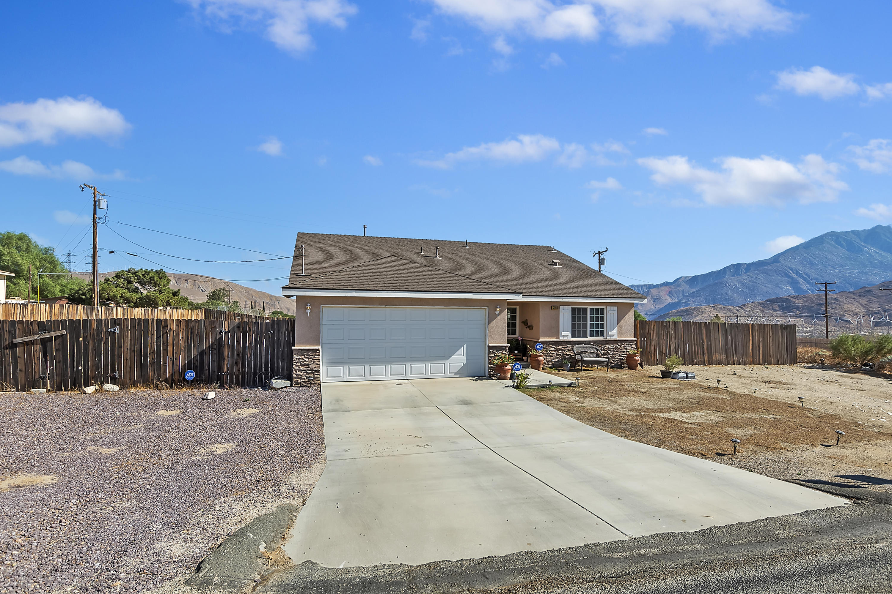 13140 Zane Way Whitewater, CA 92282 - Photo 4 of 25 a view of a house with a outdoor space