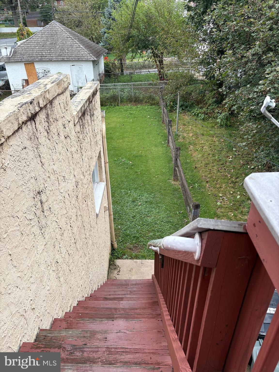 114 Strode Avenue Coatesville, PA 19320 - Photo 12 of 16 a view of a backyard with sitting area