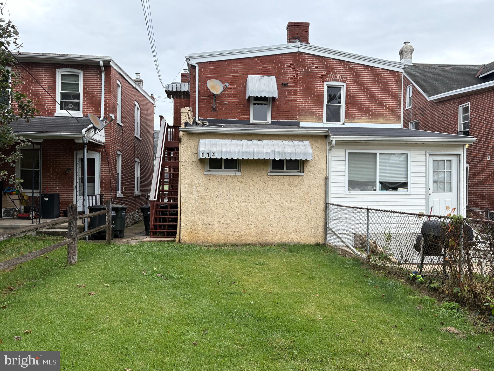 114 Strode Avenue Coatesville, PA 19320 - Photo 14 of 16 a view of a house with a yard