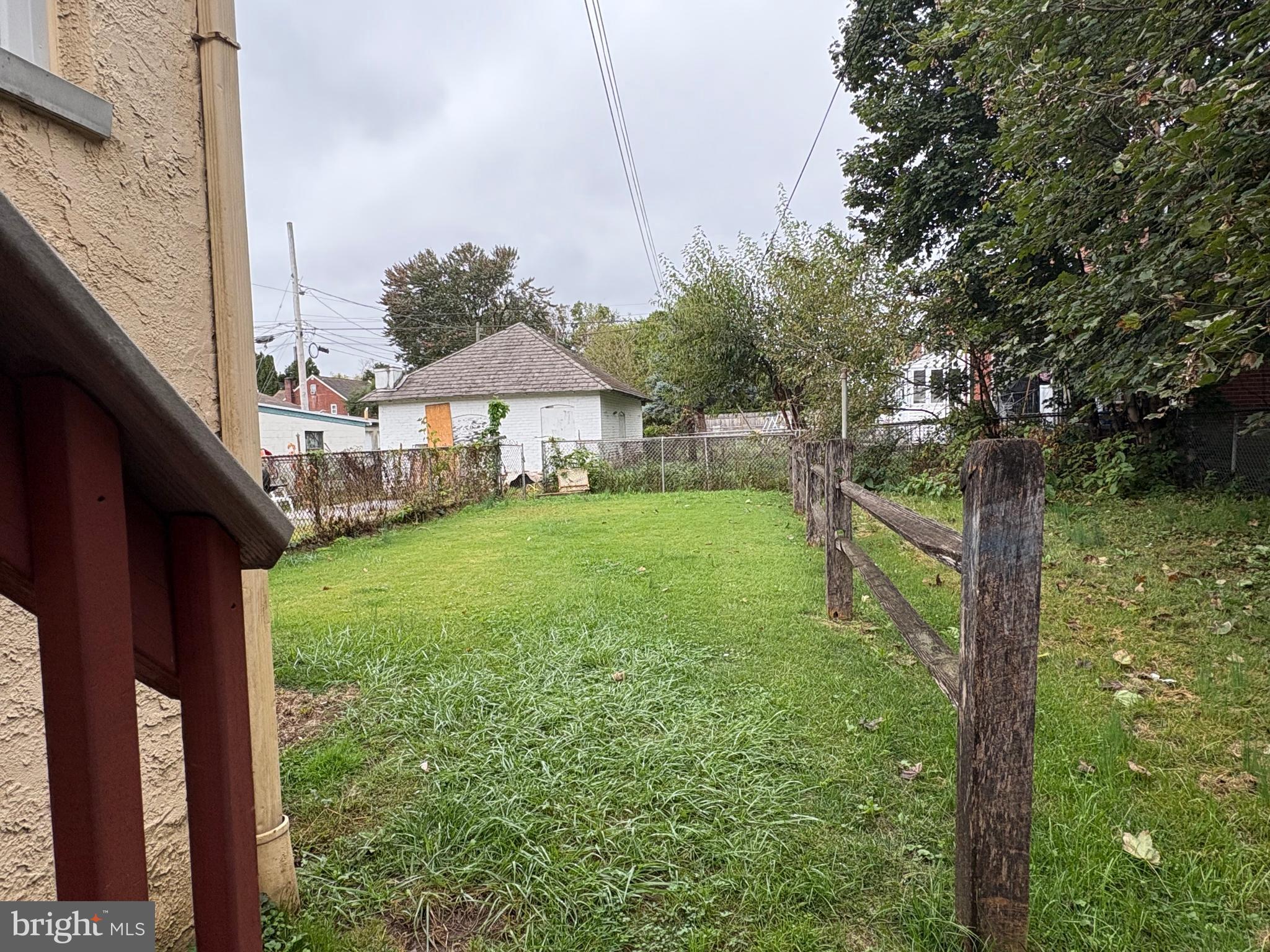 114 Strode Avenue Coatesville, PA 19320 - Photo 15 of 16 a view of a porch with a yard