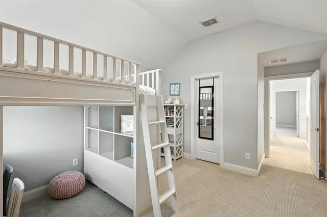a bathroom with a sink vanity granite toilet and a mirror
