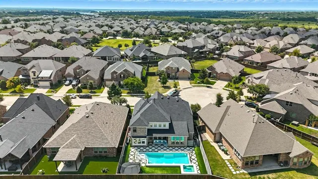 an aerial view of a city with lots of residential buildings