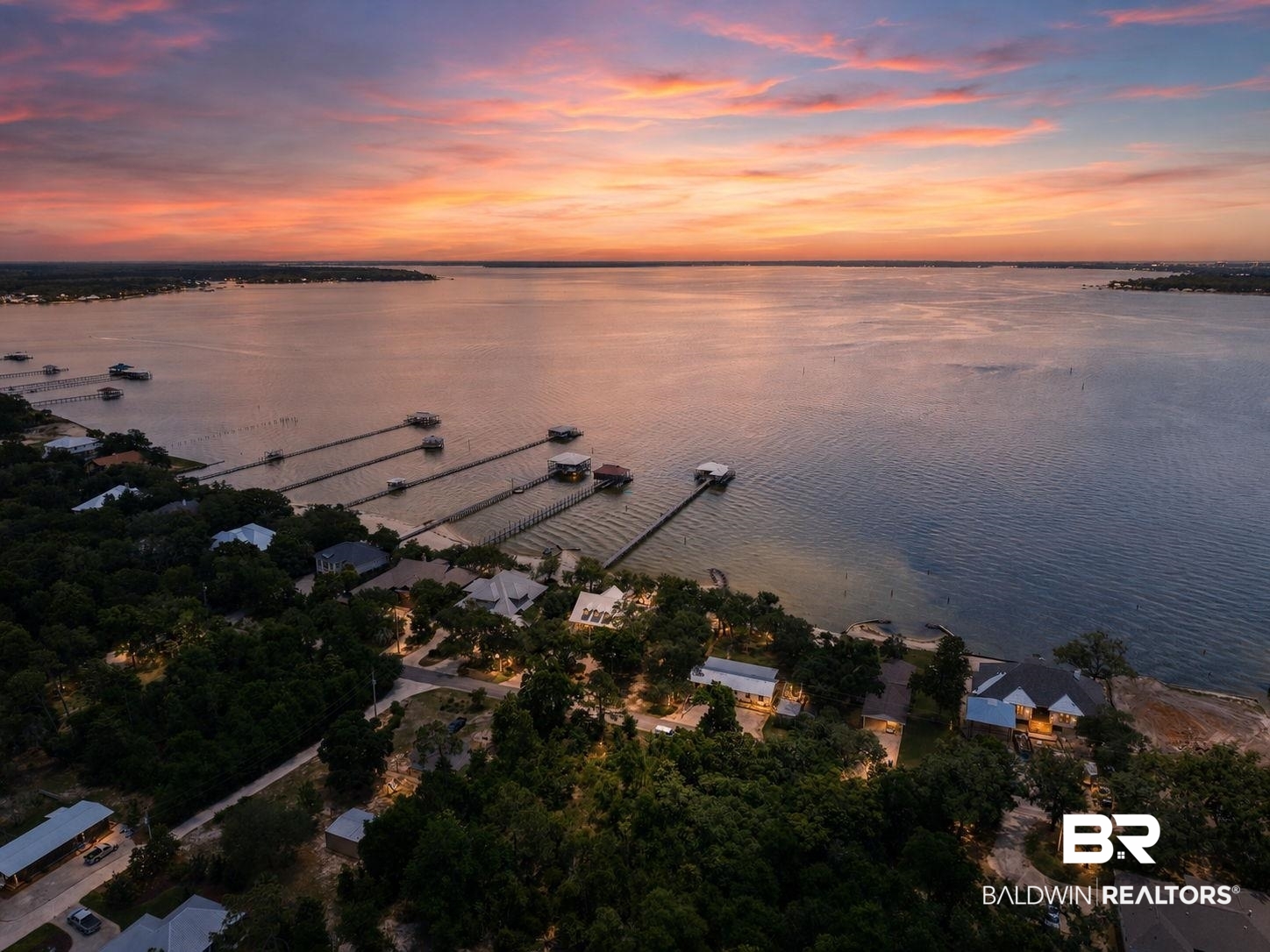 6802 Shore Drive Elberta, AL 36530 - Photo 34 of 34 Expansive waterfront properties featuring private docks along a tree-lined shore