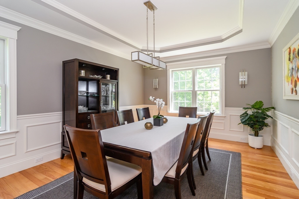 2 Hunters Lane Natick, MA 01760 - Photo 11 of 40 a view of a dining room with furniture window and wooden floor