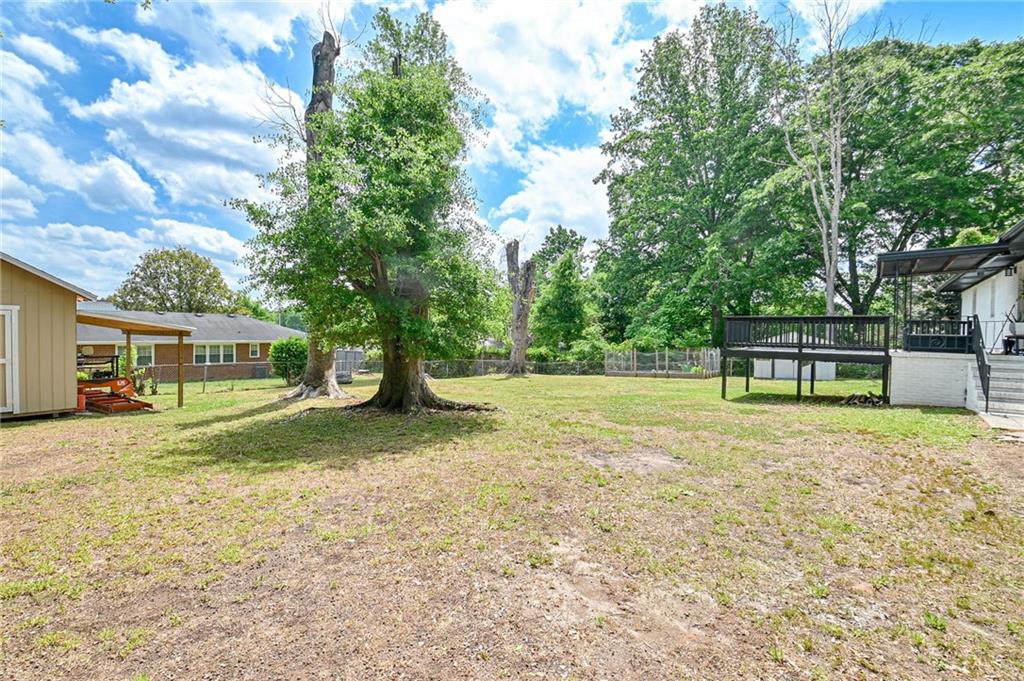 150 Sims Street Winder, GA 30680 - Photo 60 of 61 a view of a house with a yard